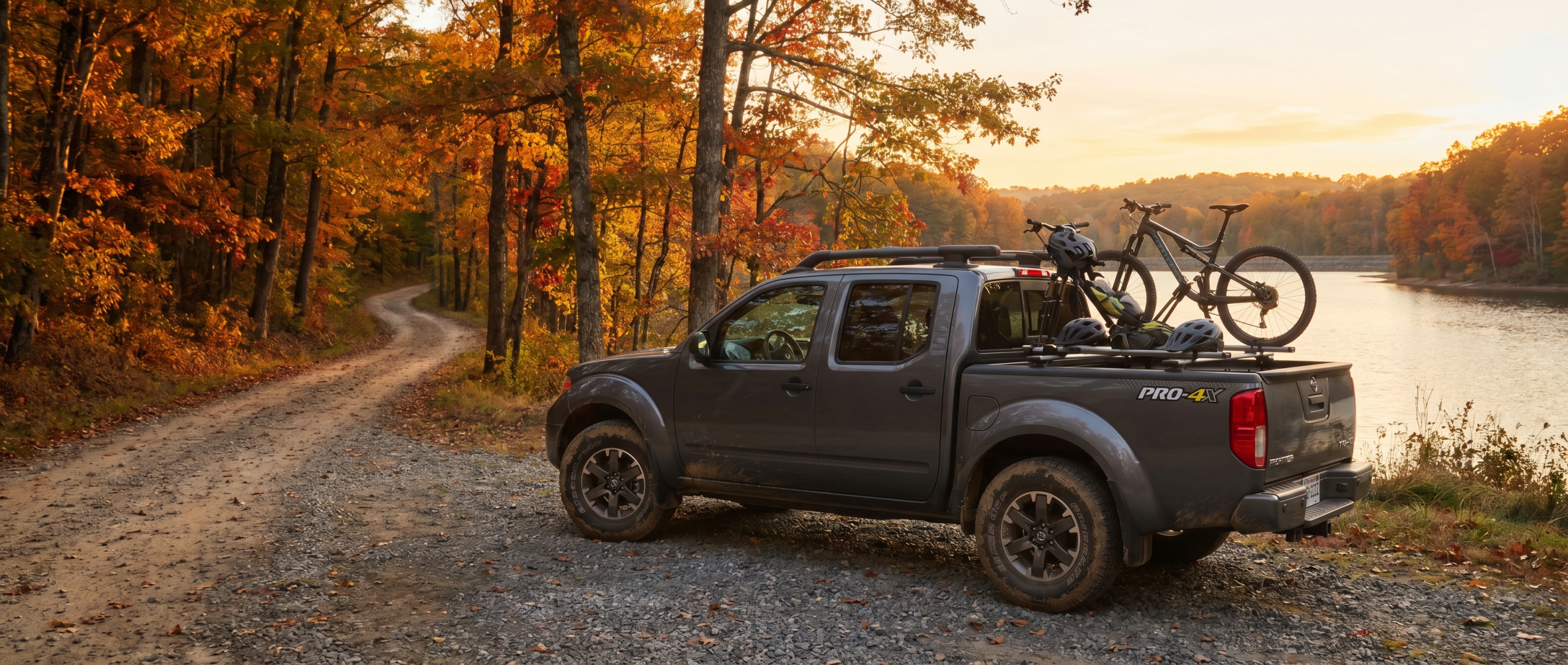 Used Nissan Frontier PRO-4X bed rail system holding mountain bikes in Upperco MD.