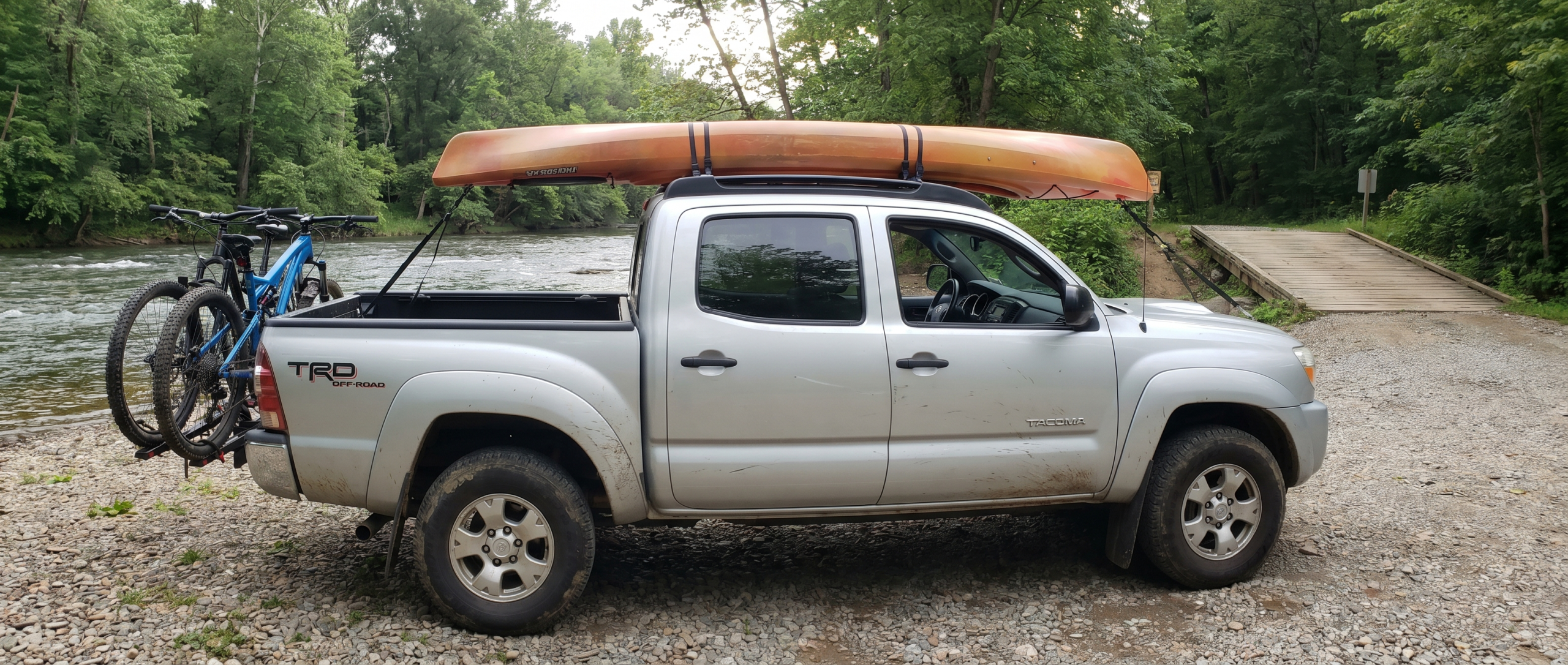 Used Toyota Tacoma with mountain bikes and kayaks in Hampstead